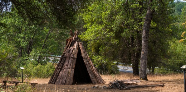 Wooden structure made of cedar bark where native people of the region made their homes. 