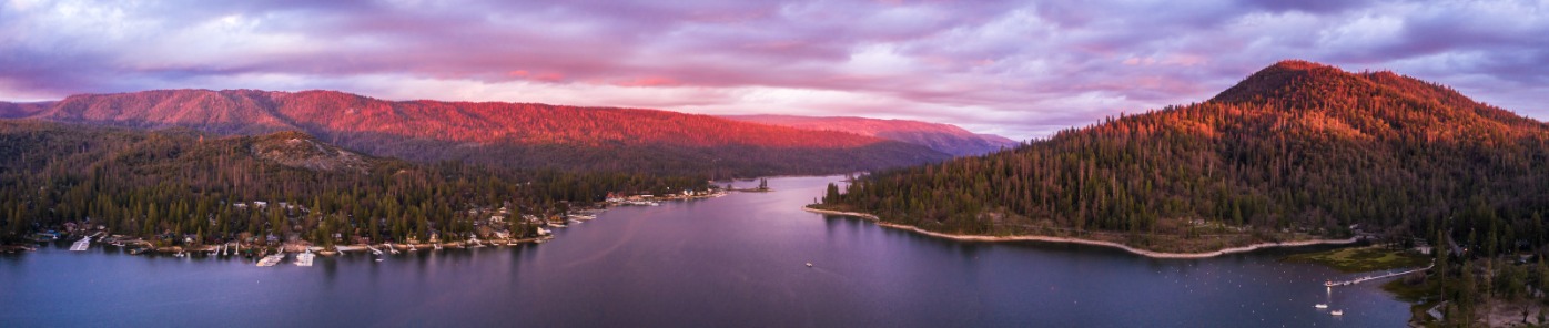 drone panoramic view of bass lake at sunset.