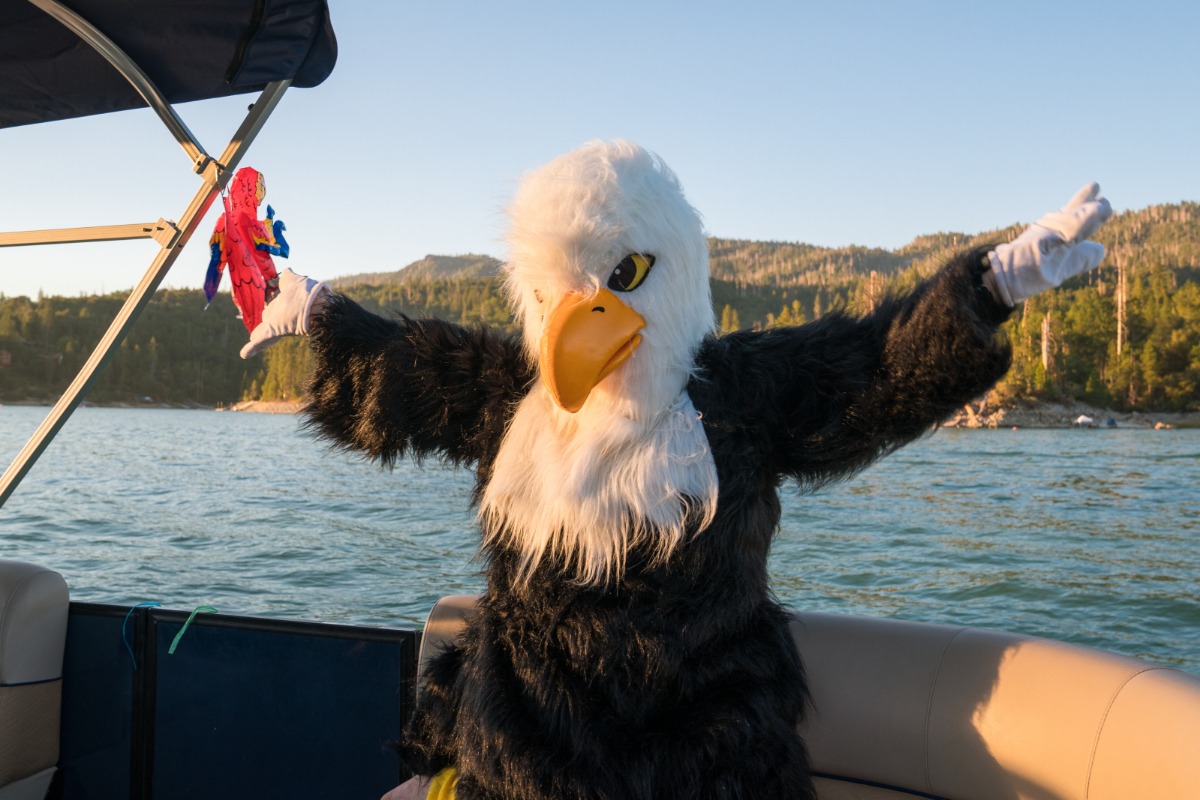 eagle mascot on a boat on bass lake