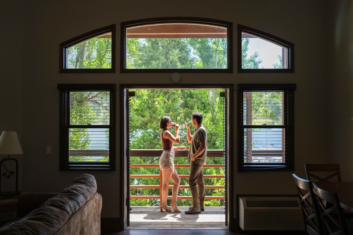 couple on balcony of suite